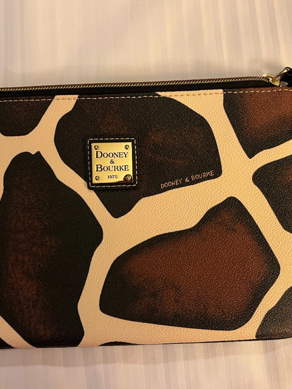 Dooney And Bourke Giraffe Print Clutch Lined Brown Leather Tassel 9in L x 6 in H